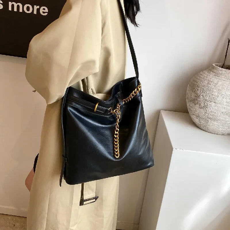 Shoulder bags with foam lining for tech safety -Large Shoulder Bags Women's Chain Tassel Snap Bucket Soft Crossbody Purses