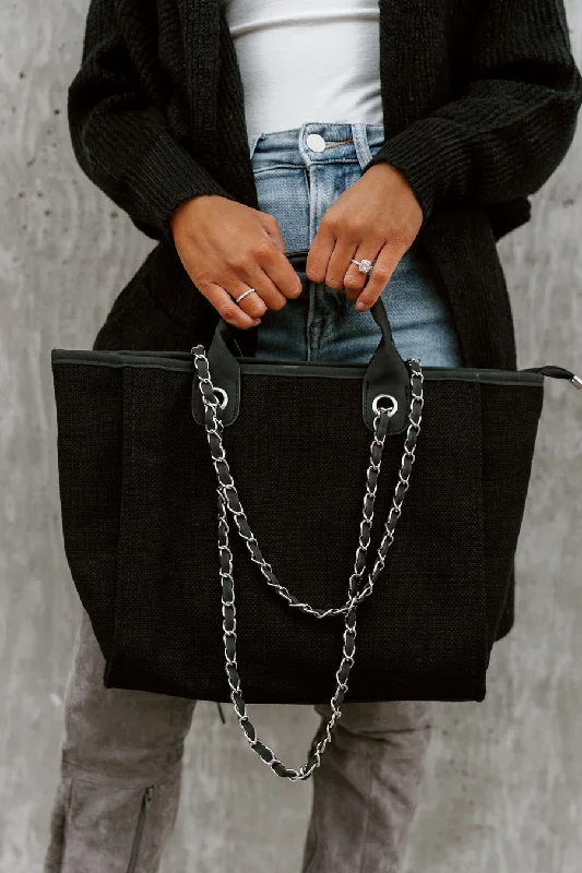 Small leather tote bags for minimalist fashionistas who prefer compact designs -THE "LIVIA" WOVEN TOTE BAG IN BLACK