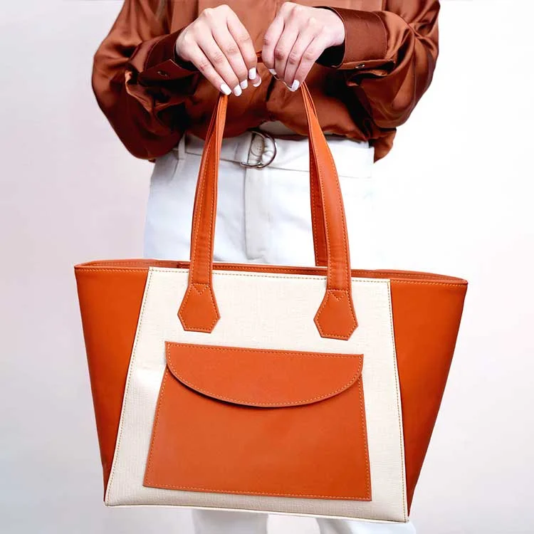 Tote bags with large interior pockets for keeping belongings organized and secure -Verve