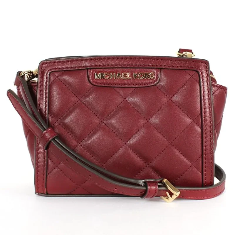 Handle bags with contrasting colors for a vibrant, stylish fashion statement -Michael Kors Selma Quilted Mini Messenger Claret Maroon Crossbody Purse Bag New